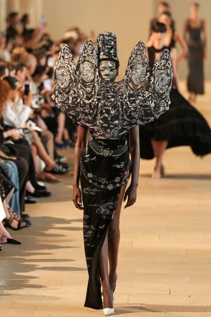 A model presents a creation by Rahul Mishra for the Women Haute Couture Fall/Winter 2026-2027 collection as part of the Paris Fashion Week, in Paris, on July 6, 2026. (Photo by Thomas SAMSON / AFP)