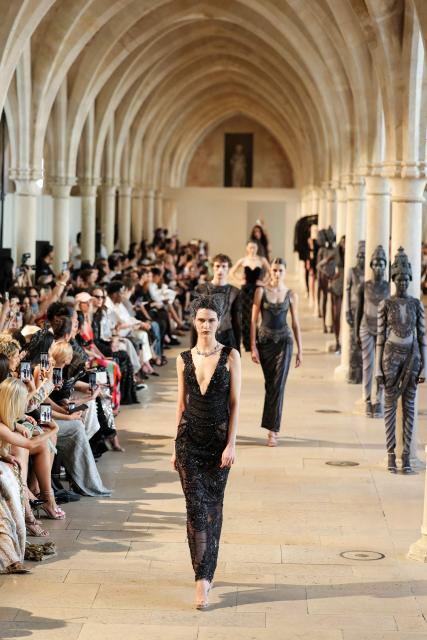A model presents a creation by Rahul Mishra for the Women Haute Couture Fall/Winter 2026-2027 collection as part of the Paris Fashion Week, in Paris, on July 6, 2026. (Photo by Thomas SAMSON / AFP)