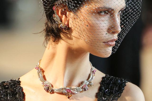 A model presents a creation by Rahul Mishra for the Women Haute Couture Fall/Winter 2026-2027 collection as part of the Paris Fashion Week, in Paris, on July 6, 2026. (Photo by Thomas SAMSON / AFP)
