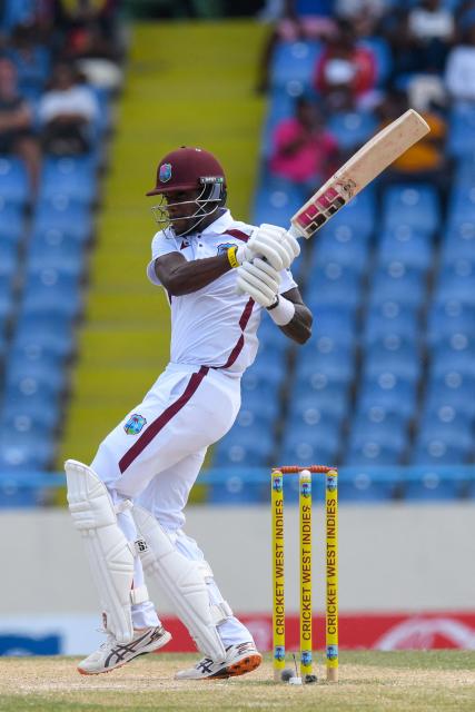 Justin Greaves of West Indies hits 4 during the 4th day of the 2nd Test between Sri Lanka and West Indies at Vivian Richards Cricket Stadium in North Sound, Antigua and Barbuda, on July 6, 2026. (Photo by Randy Brooks / AFP)