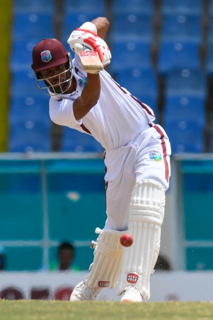 Roston Chase of West Indies hits 4 during the 4th day of the 2nd Test between Sri Lanka and West Indies at Vivian Richards Cricket Stadium in North Sound, Antigua and Barbuda, on July 6, 2026. (Photo by Randy Brooks / AFP)