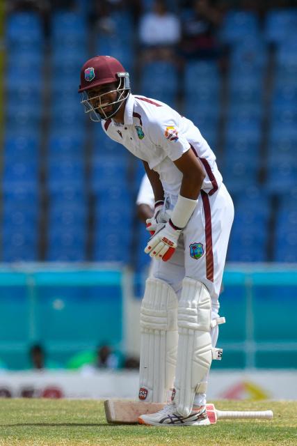 Roston Chase of West Indies reacts after being hit by Asitha Fernando of Sri Lanka during the 4th day of the 2nd Test between Sri Lanka and West Indies at Vivian Richards Cricket Stadium in North Sound, Antigua and Barbuda, on July 6, 2026. (Photo by Randy Brooks / AFP)