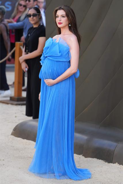 US actor Anne Hathaway poses on the red carpet upon arrival to attend the world premiere of the film 'The Odyssey' in London on July 6, 2026. (Photo by CARLOS JASSO / AFP)