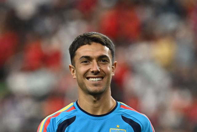 Spain's midfielder #18 Martin Zubimendi smiles during warm up ahead of the 2026 World Cup round of 16 football match between Portugal and Spain at the Dallas Stadium in Arlington on July 6, 2026. (Photo by Paul ELLIS / AFP)