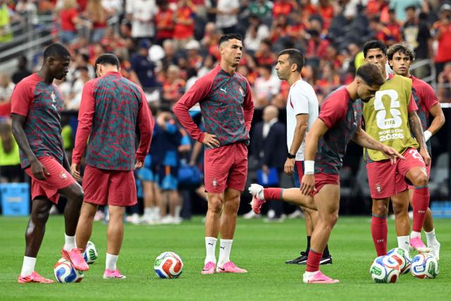 Portugal's forward #07 Cristiano Ronaldo stands in the middle of the field during warm up ahead of the 2026 World Cup round of 16 football match between Portugal and Spain at the Dallas Stadium in Arlington on July 6, 2026. (Photo by RONALDO SCHEMIDT / AFP)