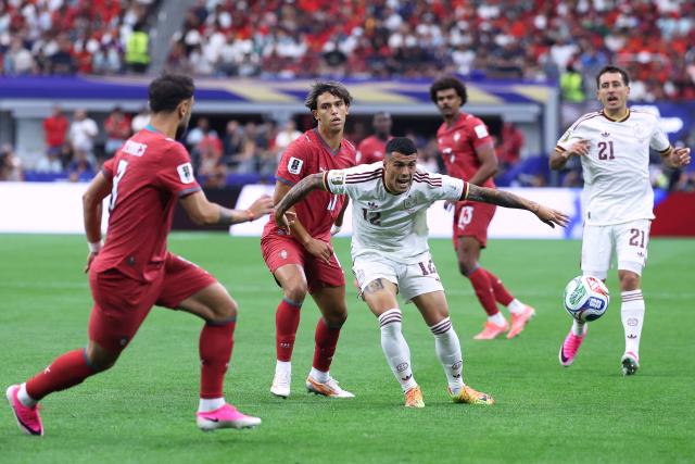 Spain's defender #12 Pedro Porro and Portugal's forward #11 Joao Felix fight for the ball during the 2026 World Cup round of 16 football match between Portugal and Spain at the Dallas Stadium in Arlington on July 6, 2026. (Photo by Thomas COEX / AFP)