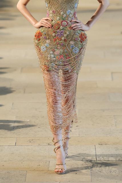 A model presents a creation by Rahul Mishra for the Women Haute Couture Fall/Winter 2026-2027 collection as part of the Paris Fashion Week, in Paris, on July 6, 2026. (Photo by Thomas SAMSON / AFP)