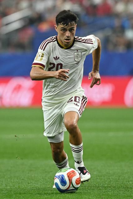 Spain's midfielder #20 Pedri controls the ball during the 2026 World Cup round of 16 football match between Portugal and Spain at the Dallas Stadium in Arlington on July 6, 2026. (Photo by Paul ELLIS / AFP)