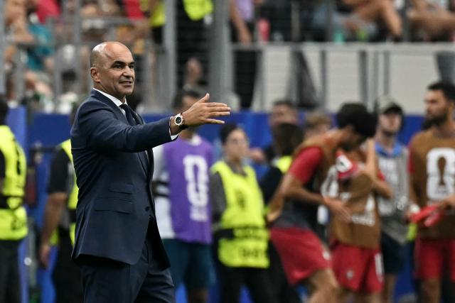 Portugal's Spanish head coach Roberto Martinez gestures during the 2026 World Cup round of 16 football match between Portugal and Spain at the Dallas Stadium in Arlington on July 6, 2026. (Photo by Paul ELLIS / AFP)