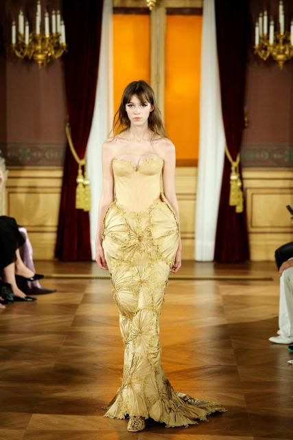 A model presents a creation for Ardazaei for the Women Haute Couture Fall/Winter 2026-2027 collection as part of the Paris Fashion Week, in Paris, on July 6, 2026. (Photo by GEOFFROY VAN DER HASSELT / AFP)