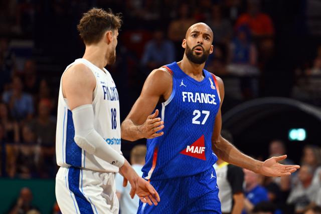 France's Rudy Gobert (R) reacts during the qualifier basketball match between France and Finland for the men's 2027 FIBA World Championships at the Palais des Sports in Pau south-western France, on July 6, 2026. (Photo by Gaizka IROZ / AFP)
