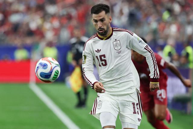 Spain's midfielder #15 Alex Baena runs with the ball during the 2026 World Cup round of 16 football match between Portugal and Spain at the Dallas Stadium in Arlington on July 6, 2026. (Photo by Aric Becker / AFP)