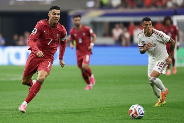 Portugal's forward #07 Cristiano Ronaldo runs for the ball during the 2026 World Cup round of 16 football match between Portugal and Spain at the Dallas Stadium in Arlington on July 6, 2026. (Photo by Aric Becker / AFP)
