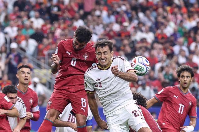 Portugal's midfielder #08 Bruno Fernandes and Spain's forward #21 Mikel Oyarzabal fight for the ball during the 2026 World Cup round of 16 football match between Portugal and Spain at the Dallas Stadium in Arlington on July 6, 2026. (Photo by Thomas COEX / AFP)