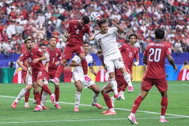 Portugal's midfielder #08 Bruno Fernandes and Spain's forward #21 Mikel Oyarzabal fight for the ball during the 2026 World Cup round of 16 football match between Portugal and Spain at the Dallas Stadium in Arlington on July 6, 2026. (Photo by Thomas COEX / AFP)