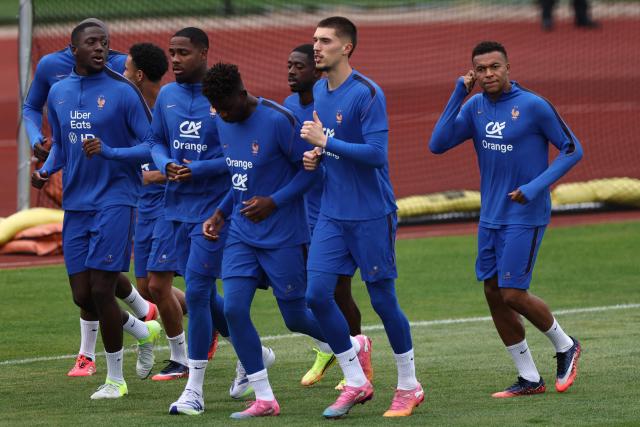 (From L) France's defender #15 Ibrahima Konate, goalkeeper #16 Mike Maignan, goalkeeper #01 Brice Samba, forward #07 Ousmane Dembele, goalkeeper #23 Robin Risser and forward #10 Kylian Mbappe attend a training session at Bentley University in Waltham, near Boston, on July 07, 2026, during the 2026 World Cup football tournament. (Photo by FRANCK FIFE / AFP)