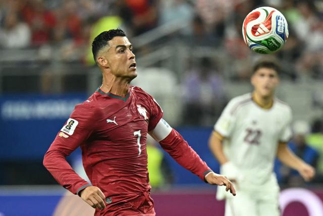 Portugal's forward #07 Cristiano Ronaldo eyes the ball during the 2026 World Cup round of 16 football match between Portugal and Spain at the Dallas Stadium in Arlington on July 6, 2026. (Photo by Paul ELLIS / AFP)