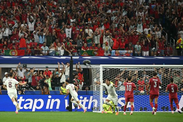 Spain's midfielder #06 Mikel Merino celebrates scoring his team's first goal during the 2026 World Cup round of 16 football match between Portugal and Spain at the Dallas Stadium in Arlington on July 6, 2026. (Photo by Paul ELLIS / AFP)