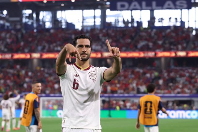 Spain's midfielder #06 Mikel Merino celebrates scoring his team's first goal during the 2026 World Cup round of 16 football match between Portugal and Spain at the Dallas Stadium in Arlington on July 6, 2026. (Photo by Thomas COEX / AFP)
