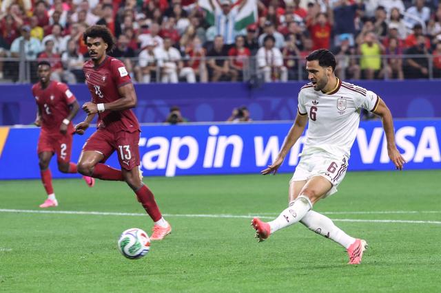 Spain's midfielder #06 Mikel Merino scores his team's first goal during the 2026 World Cup round of 16 football match between Portugal and Spain at the Dallas Stadium in Arlington on July 6, 2026. (Photo by Thomas COEX / AFP)