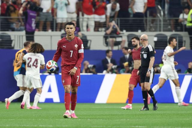 Portugal's forward #07 Cristiano Ronaldo reacts after Spain's first goal scored by midfielder #06 Mikel Merino (unseen) during the 2026 World Cup round of 16 football match between Portugal and Spain at the Dallas Stadium in Arlington on July 6, 2026. (Photo by Aric Becker / AFP)