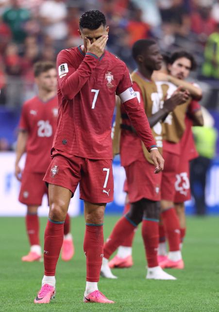 Portugal's forward #07 Cristiano Ronaldo reacts after losing the 2026 World Cup round of 16 football match between Portugal and Spain at the Dallas Stadium in Arlington on July 6, 2026. (Photo by Thomas COEX / AFP)
