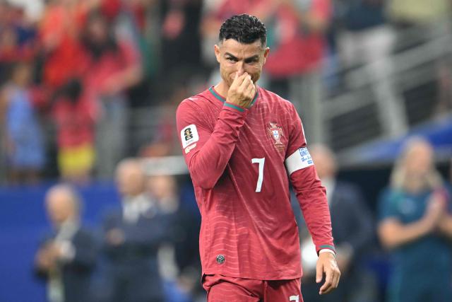 Portugal's forward #07 Cristiano Ronaldo reacts after losing the 2026 World Cup round of 16 football match between Portugal and Spain at the Dallas Stadium in Arlington on July 6, 2026. (Photo by RONALDO SCHEMIDT / AFP)
