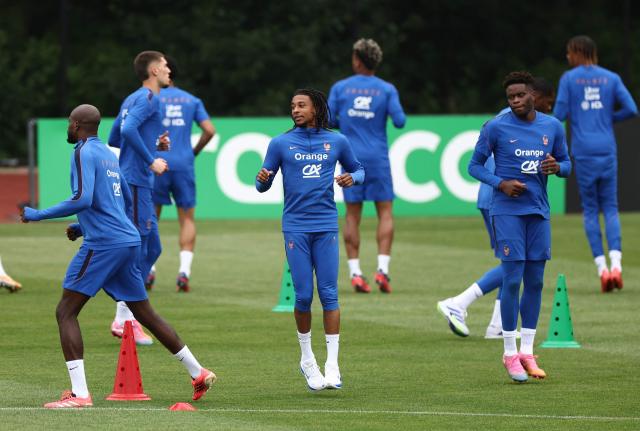 France's forward #11 Michael Olise and France's goalkeeper #01 Brice Samba take part in a training session at Bentley University in Waltham, near Boston, on July 7, 2026, during the 2026 World Cup football tournament. (Photo by FRANCK FIFE / AFP)