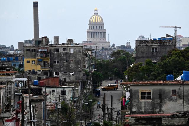 A general view of Havana is seen during a nationwide blackout on July 6, 2026. Cuba on July 6 suffered its third nationwide power outage since the start of the year, the state electricity company said. The impoverished island was already struggling to keep the lights on before US President Donald Trump in January imposed an oil blockade, which has depleted the already dwindling supply of fuel for Cuba's power plants. (Photo by YAMIL LAGE / AFP)