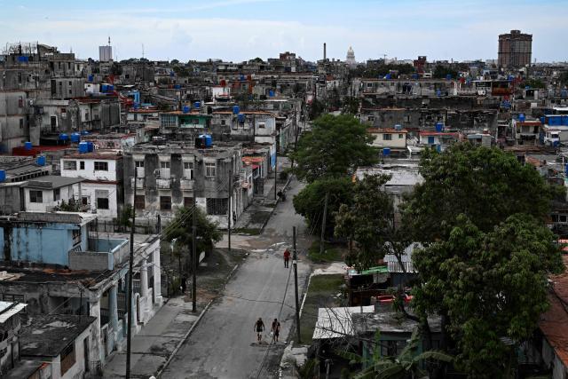 A general view of Havana is seen during a nationwide blackout on July 6, 2026. Cuba on July 6 suffered its third nationwide power outage since the start of the year, the state electricity company said. The impoverished island was already struggling to keep the lights on before US President Donald Trump in January imposed an oil blockade, which has depleted the already dwindling supply of fuel for Cuba's power plants. (Photo by YAMIL LAGE / AFP)