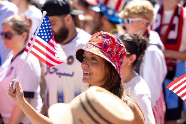 US fans march through Pioneer Square before the 2026 World Cup round of 16 match between USA and Belgium in Seattle, Washington, on July 6, 2026. (Photo by Jason Redmond / AFP)