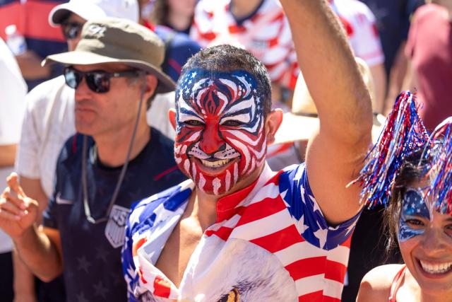 US fans march through Pioneer Square before the 2026 World Cup round of 16 match between USA and Belgium in Seattle, Washington, on July 6, 2026. (Photo by Jason Redmond / AFP)