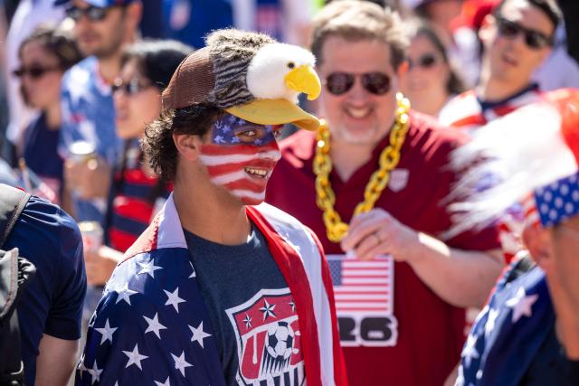 US fans march through Pioneer Square before the 2026 World Cup round of 16 match between USA and Belgium in Seattle, Washington, on July 6, 2026. (Photo by Jason Redmond / AFP)