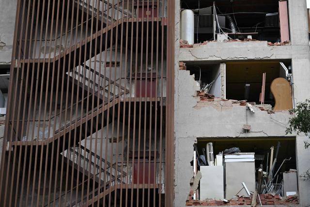View of a damaged building which will undergo official inspection to determine its habitability in Caracas, on July 6, 2026, following the June 24 earthquakes that hit the region. The death toll from Venezuela's twin earthquakes has risen to 3,535, with more than 16,700 injured in the disaster, according to updated official figures released on July 6. (Photo by Raul ARBOLEDA / AFP)