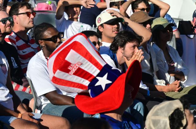 Fans watch the 2026 World Cup round of 16 match between USA and Belgium at the Pasadena Civic Auditorium Plaza fan zone in Pasadena, California, on July 6, 2026. (Photo by Frederic J. Brown / AFP)