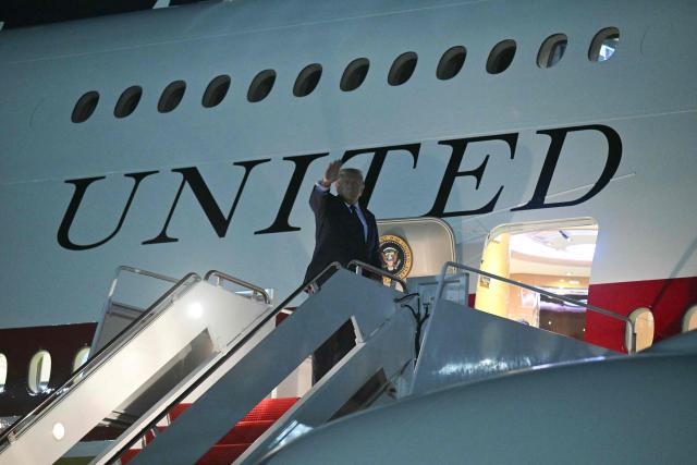 US President Donald Trump waves as he boards Air Force One, at Joint Base Andrews, Maryland, on July 6, 2026. Trump is traveling to Ankara, Turkey to attend a NATO summit. (Photo by SAUL LOEB / AFP)
