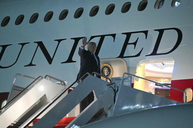 US President Donald Trump waves as he boards Air Force One, at Joint Base Andrews, Maryland, on July 6, 2026. Trump is traveling to Ankara, Turkey to attend a NATO summit. (Photo by SAUL LOEB / AFP)