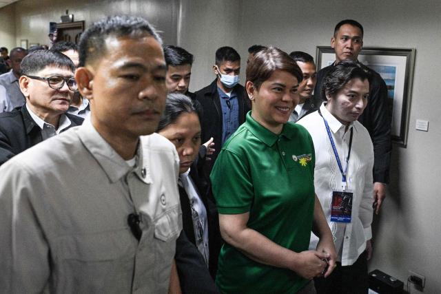 Philippine Vice President Sara Duterte arrives before the start of the impeachment trial at the Senate of the Philippines in Pasay, Metro Manila on July 7, 2026. (Photo by NOEL CELIS / POOL / AFP)