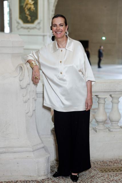 French actress Carole Bouquet poses during a photocall prior to attend the Chanel Women Haute Couture Fall/Winter 2026-2027 collection as part of the Paris Fashion Week, in Paris, on July 7, 2026. (Photo by GEOFFROY VAN DER HASSELT / AFP)