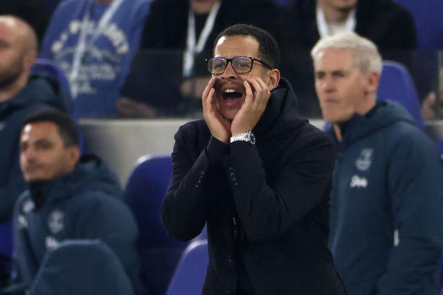 (FILES) Chelsea's English head coach Liam Rosenior shouts instructions to the players from the touchline during the English Premier League football match between Everton and Chelsea at the Hill Dickinson Stadium in Liverpool, north west England on March 21, 2026. Liam Rosenior, a 41-year-old Englishman who previously coached Strasbourg and is coming off a failed stint at Chelsea—where he was fired in April, just a few months after his arrival—is the new head coach of Paris FC, the Paris-based club announced on July 7, 2026. (Photo by Darren Staples / AFP)