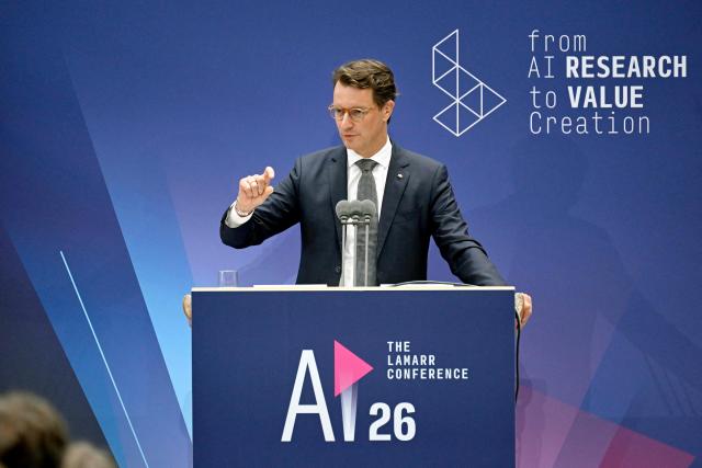 North Rhine-Westphalia's State Premier Hendrik Wuest speaks during the Lamarr Conference at the World Conference Centre in Bonn, western Germany, on July 7, 2026. The Lamarr Conference is an international conference on artificial intelligence running from July 7-8 and bringing together "those shaping scientific foundations and those translating AI advances into tangible impact". In recognition of his achievements in AI research, development and knowledge transfer, the 2026 Lamarr Award will be presented to Jaroslaw Kutylowski. (Photo by Ina FASSBENDER / AFP)