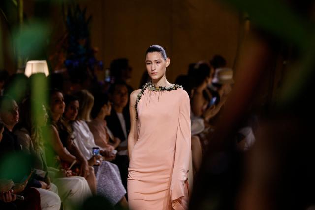 Brazilian model Luiza Perote presents a creation for Chanel for the Women Haute Couture Fall/Winter 2026-2027 collection as part of the Paris Fashion Week, in Paris, on July 7, 2026. (Photo by GEOFFROY VAN DER HASSELT / AFP)
