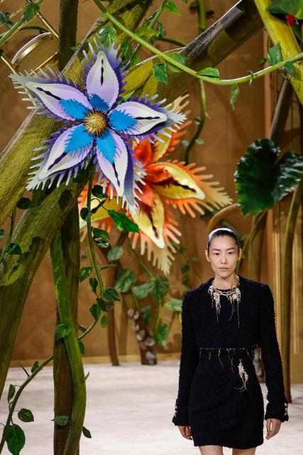 Chinese model Liu Wen presents a creation for Chanel for the Women Haute Couture Fall/Winter 2026-2027 collection as part of the Paris Fashion Week, in Paris, on July 7, 2026. (Photo by GEOFFROY VAN DER HASSELT / AFP)