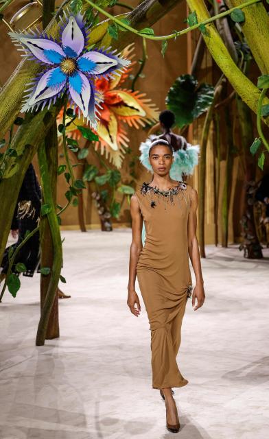 A model presents a creation for Chanel for the Women Haute Couture Fall/Winter 2026-2027 collection as part of the Paris Fashion Week, in Paris, on July 7, 2026. (Photo by GEOFFROY VAN DER HASSELT / AFP)