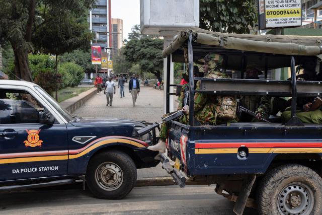 Police sit in their trucks as they take a break from patrols in the Central Business District (CBD) in anticipation of anti-government protests to commemorate the struggle against government oppression on annual day of protest known as Saba-saba in Nairobi on July 07, 2026. Kenyan police banned a march to mark an annual day of protest on Tuesday, using plainclothes officers and unmarked cars to drag away even the tiny group that managed to assemble.
The Kenyan government of President William Ruto has taken a zero-tolerance attitude to even the slightest hint of protest after massive and deadly demonstrations over the past two years. (Photo by Tony KARUMBA / AFP)