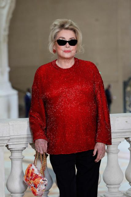 French actress Catherine Deneuve poses during a photocall prior to attend the Chanel Women Haute Couture Fall/Winter 2026-2027 collection as part of the Paris Fashion Week, in Paris, on July 7, 2026. (Photo by GEOFFROY VAN DER HASSELT / AFP)