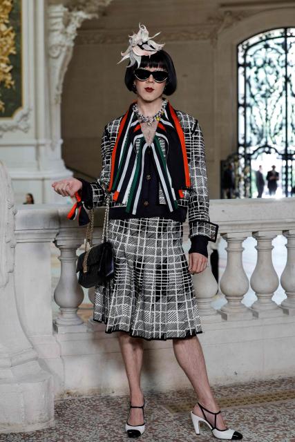 US actor Cole Escola poses during a photocall prior to attend the Chanel Women Haute Couture Fall/Winter 2026-2027 collection as part of the Paris Fashion Week, in Paris, on July 7, 2026. (Photo by GEOFFROY VAN DER HASSELT / AFP)