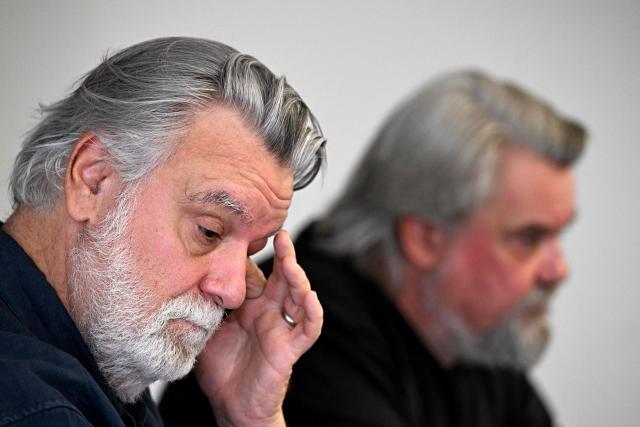 French Ligue 2 football club Montpellier Herault Sport Club's French President Laurent Nicollin (L) and his brother Olivier Nicollin, CEO of the Nicollin Group a company specialised in waste collection, urban and industrial cleaning, attend a press conference in Montpellier on july 7, 2026. (Photo by Gabriel BOUYS / AFP)