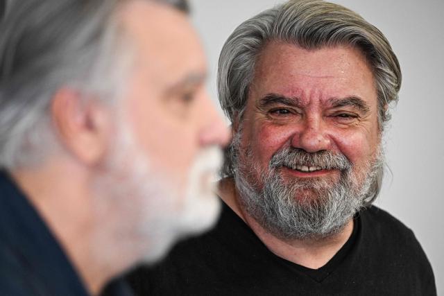 French Ligue 2 football club Montpellier Herault Sport Club's French President Laurent Nicollin (L) and his brother Olivier Nicollin, CEO of the Nicollin Group a company specialised in waste collection, urban and industrial cleaning, attend a press conference in Montpellier on july 7, 2026. (Photo by Gabriel BOUYS / AFP)