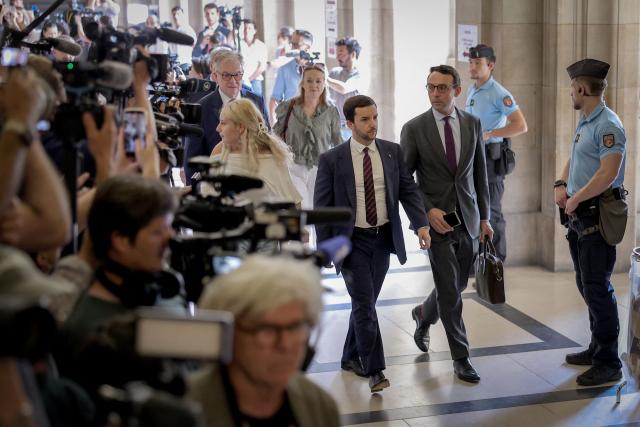 Rassemblement National's MP Jean-Philippe Tanguy (C) and Rassemblement National's MP Renaud Labaye (R) arrive to attend the verdict in the appeal trial of RN former or actual members on charges of embezzlement of European public funds in a case of alleged European Parliament fake jobs at Paris Court of Appeal on July 7, 2026. A lower court last year sentenced longtime party leader and three-time presidential candidate, Marine Le Pen, to a five-year ban from public office and two years in prison over a fake jobs scam at the European Parliament. The appeals court will rule on whether to uphold the ban in a case that has upended her presidential aspirations. (Photo by Kenzo TRIBOUILLARD / AFP)